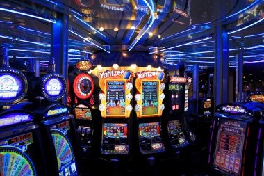 Slot game interface showing reels, stake controls, and bonus features on besti69 slot